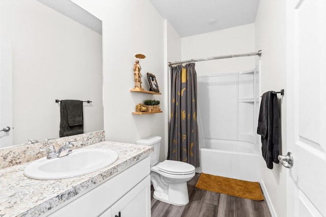 2509 SW Kenilworth St, Port Saint Lucie, FL 34953 - bathroom featuring wood finished floors, toilet, vanity, and shower / bath combo with shower curtain