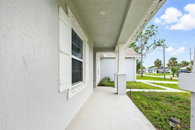 2509 SW Kenilworth St, Port Saint Lucie, FL 34953 - view of patio with a residential view