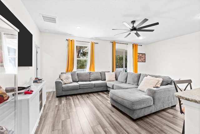 2509 SW Kenilworth St, Port Saint Lucie, FL 34953 - living area with ceiling fan, light wood-style floors, and recessed lighting