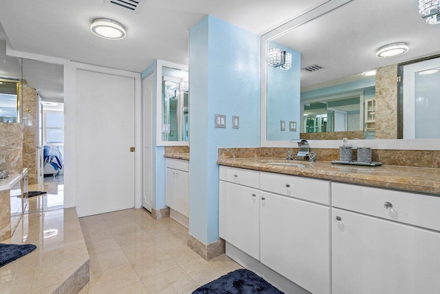 3000 S Ocean Blvd Unit 6010, Boca Raton, FL 33432 - bathroom featuring vanity and tile patterned floors