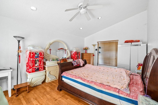 9023 Seminole Pratt Whitney Rd, The Acreage, FL 33470 - bedroom with lofted ceiling, wood finished floors, recessed lighting, and a ceiling fan