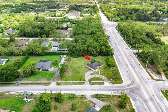 9023 Seminole Pratt Whitney Rd, The Acreage, FL 33470 - aerial view of property and surrounding area featuring a main thoroughfare and nearby suburban area