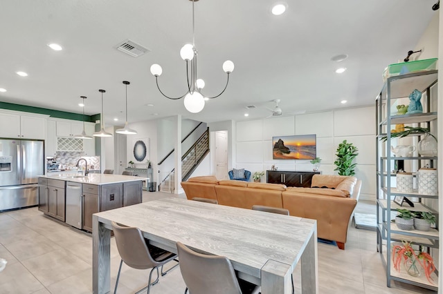 4646 Eventing St, Lake Worth, FL 33467 - dining area with stairway, recessed lighting, and light tile patterned floors