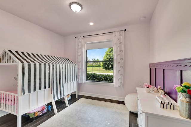4646 Eventing St, Lake Worth, FL 33467 - bedroom with baseboards and dark wood-style flooring