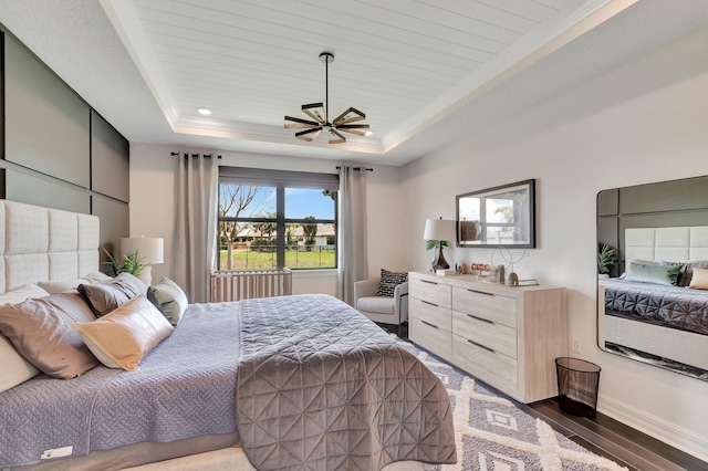 4646 Eventing St, Lake Worth, FL 33467 - bedroom featuring a raised ceiling and dark wood finished floors