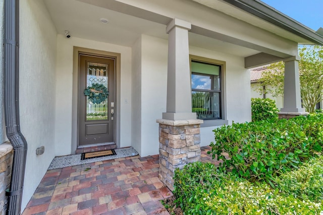 4646 Eventing St, Lake Worth, FL 33467 - property entrance featuring stucco siding and covered porch