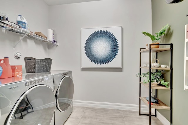 4646 Eventing St, Lake Worth, FL 33467 - laundry room featuring washer and dryer and baseboards