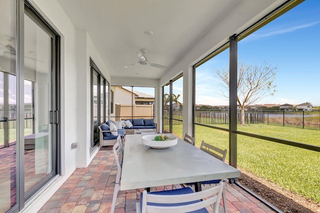 4646 Eventing St, Lake Worth, FL 33467 - sunroom / solarium with ceiling fan, brick floors, an outdoor hangout area, and outdoor dining area