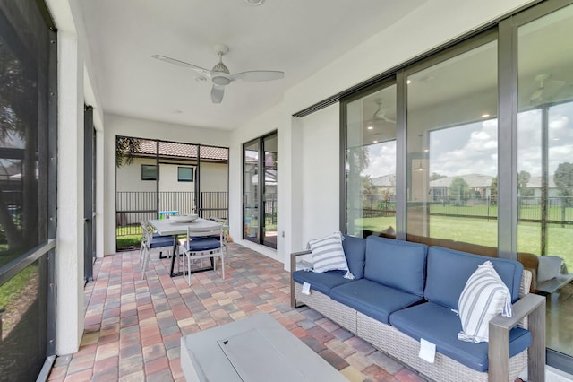 4646 Eventing St, Lake Worth, FL 33467 - sunroom with an outdoor living space, ceiling fan, and outdoor dining space