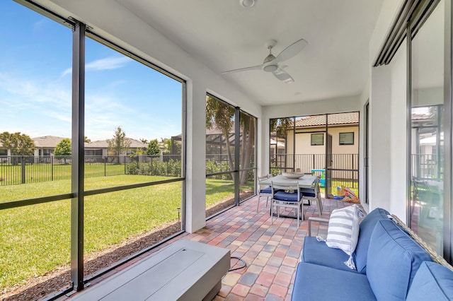 4646 Eventing St, Lake Worth, FL 33467 - sunroom featuring a ceiling fan, plenty of natural light, and outdoor dining space
