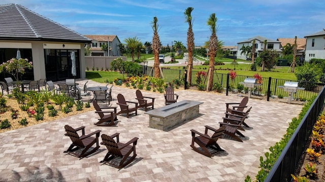 4646 Eventing St, Lake Worth, FL 33467 - fenced backyard with a fire pit, a patio, and a residential view