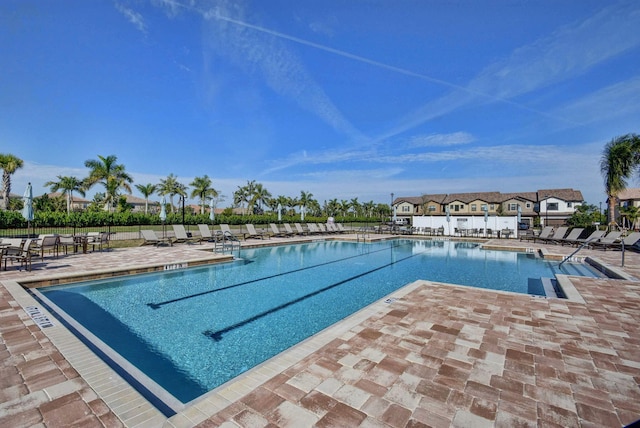 4646 Eventing St, Lake Worth, FL 33467 - community pool with a patio area
