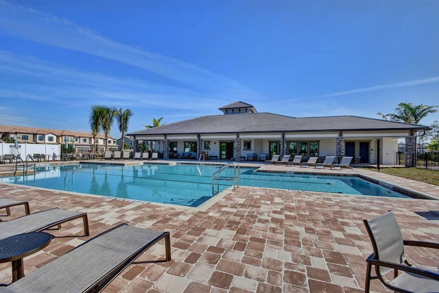 4646 Eventing St, Lake Worth, FL 33467 - community pool featuring a patio area