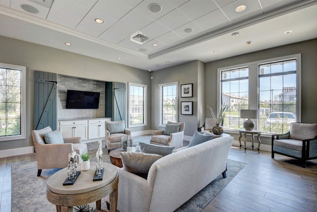 4646 Eventing St, Lake Worth, FL 33467 - living area with a tray ceiling and light wood-style flooring