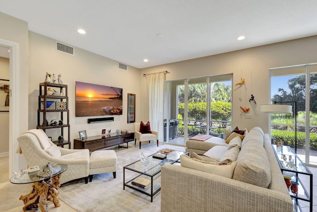 living room with recessed lighting and healthy amount of natural light