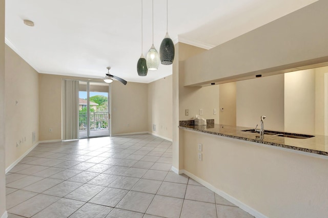 6510 Emerald Dunes Dr Unit 302, West Palm Beach, FL 33411 - unfurnished living room featuring light tile patterned flooring, ceiling fan, baseboards, and ornamental molding