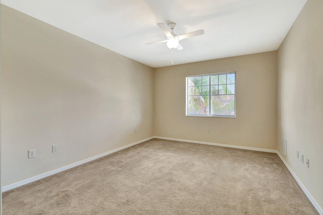 6510 Emerald Dunes Dr Unit 302, West Palm Beach, FL 33411 - unfurnished room featuring light carpet, ceiling fan, and baseboards