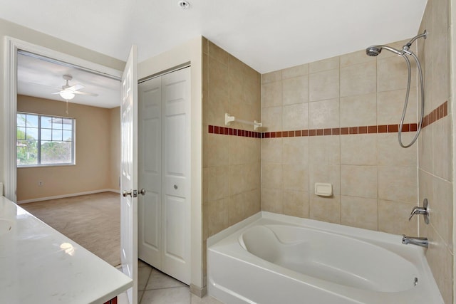6510 Emerald Dunes Dr Unit 302, West Palm Beach, FL 33411 - full bathroom featuring washtub / shower combination, vanity, ceiling fan, baseboards, and tile patterned floors