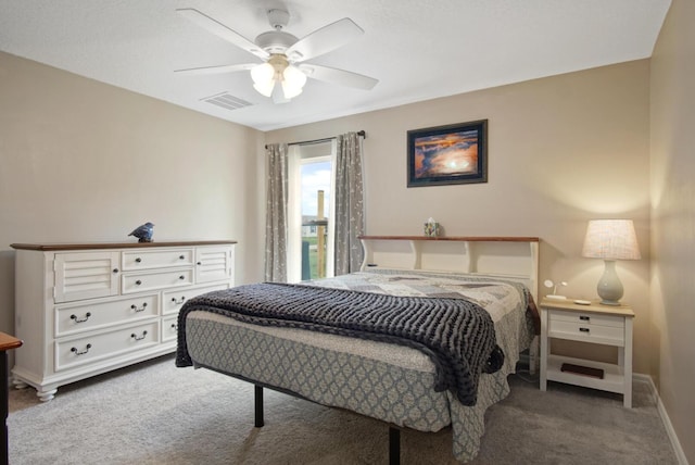 bedroom featuring carpet, baseboards, and ceiling fan