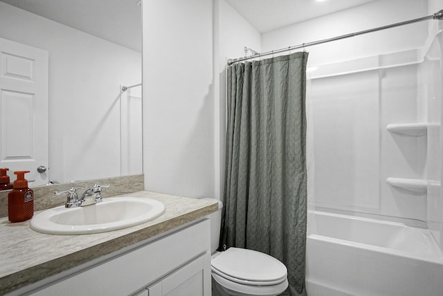 full bath featuring vanity, toilet, and shower / bath combo