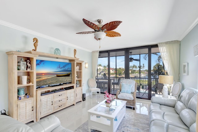 living area with ceiling fan and crown molding