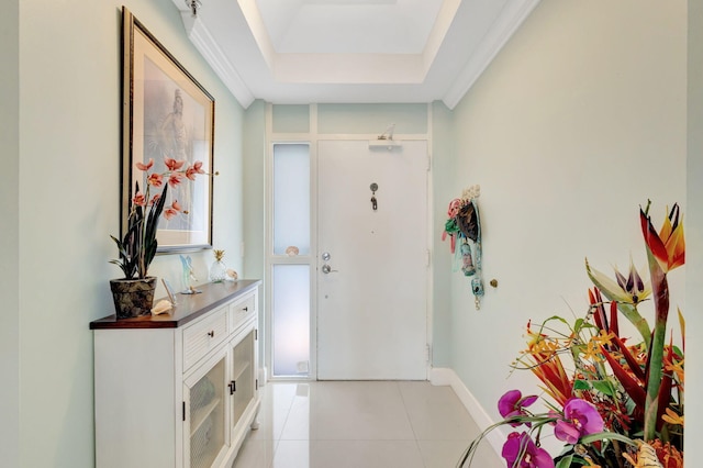 entrance foyer with light tile patterned floors and baseboards