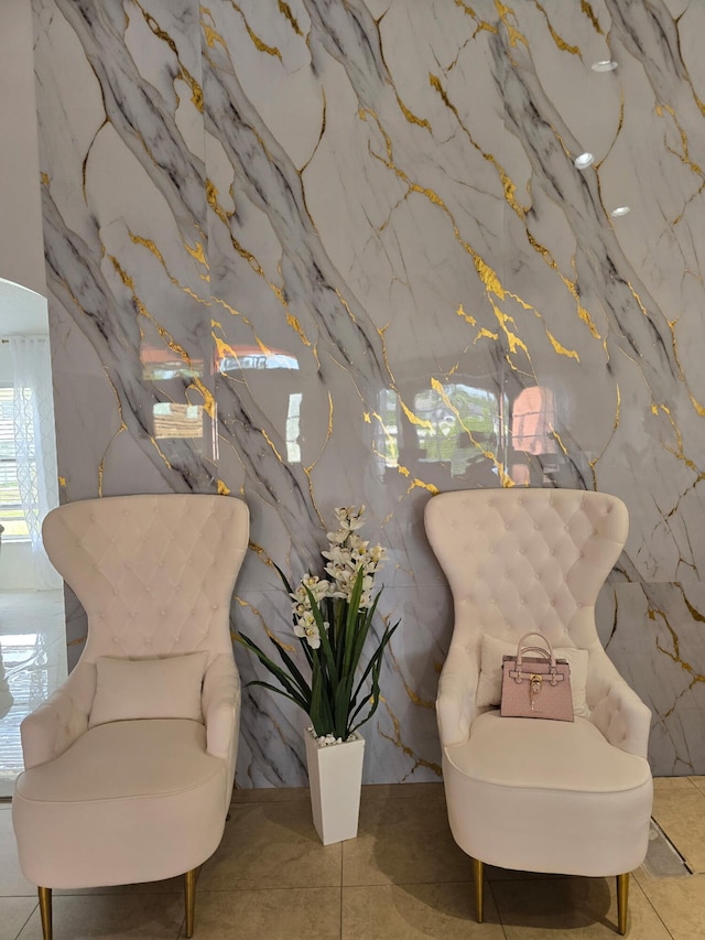 living area featuring tile patterned flooring