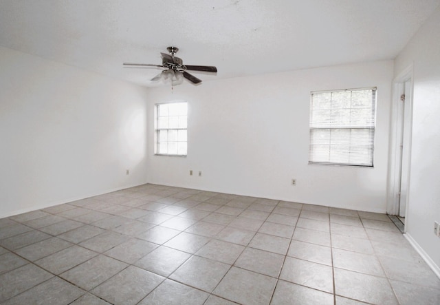 1561 SE Arenson Ln, Port Saint Lucie, FL 34952 - unfurnished room with a ceiling fan and light tile patterned flooring