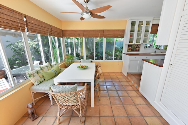 1228 George Bush Blvd Unit 4, Delray Beach, FL 33483 - sunroom featuring tile patterned flooring