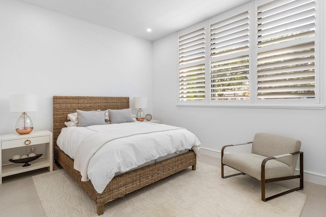 bedroom with baseboards and recessed lighting