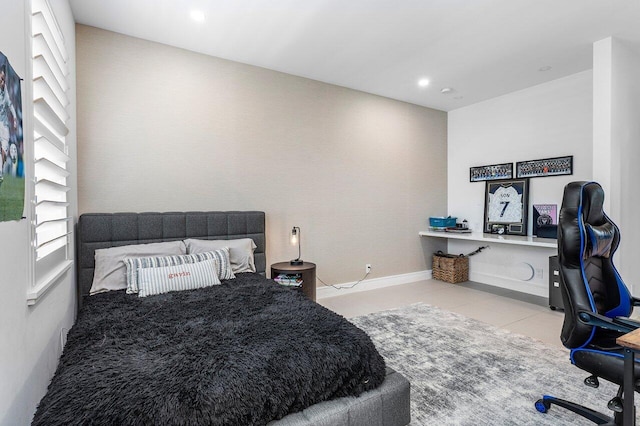 bedroom featuring tile patterned floors, recessed lighting, and baseboards