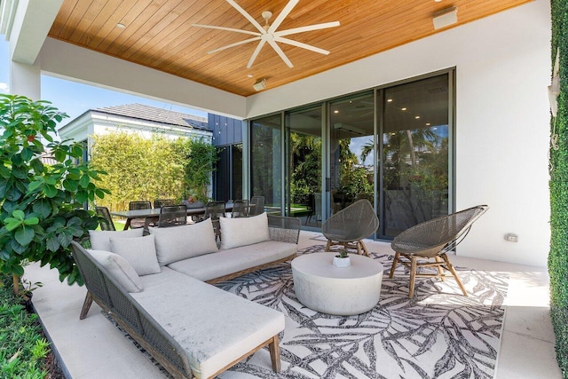 view of patio / terrace featuring a ceiling fan and an outdoor hangout area