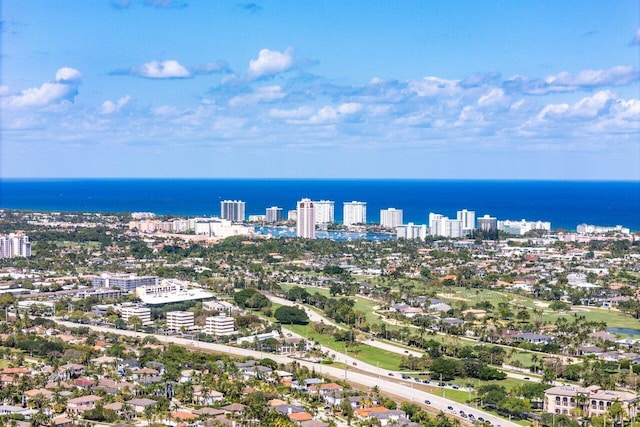 view of urban area featuring a nearby body of water