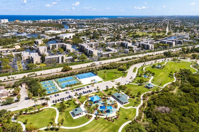 aerial overview of property's location featuring a nearby body of water and nearby urban area
