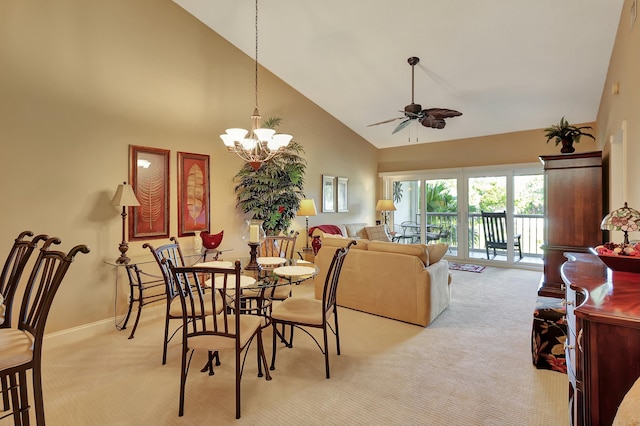 212 Cypress Point Dr, Palm Beach Gardens, FL 33418 - dining space with light carpet, high vaulted ceiling, ceiling fan, baseboards, and a chandelier