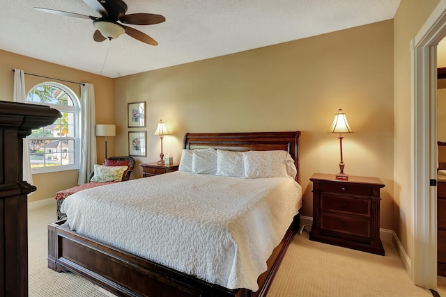 212 Cypress Point Dr, Palm Beach Gardens, FL 33418 - bedroom featuring carpet, baseboards, ceiling fan, and a textured ceiling