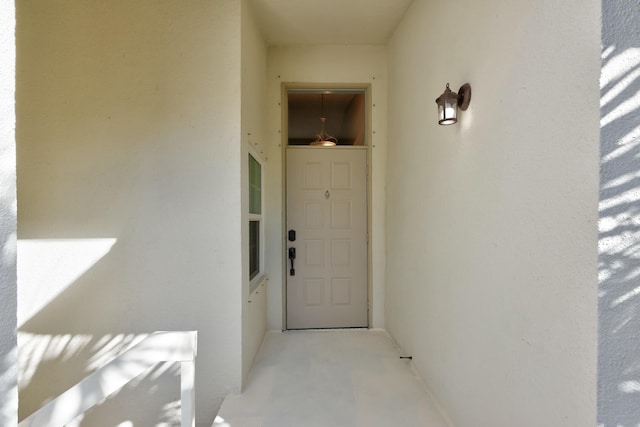 212 Cypress Point Dr, Palm Beach Gardens, FL 33418 - doorway to property featuring stucco siding