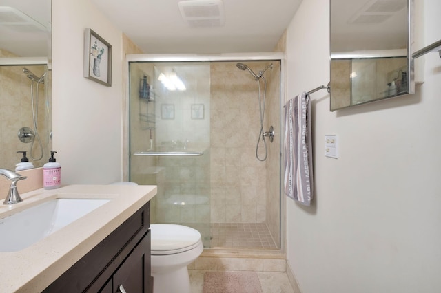 2070 Homewood Blvd Unit 1115, Delray Beach, FL 33445 - full bathroom with a stall shower, toilet, vanity, and tile patterned floors