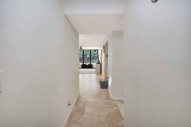 2070 Homewood Blvd Unit 1115, Delray Beach, FL 33445 - hallway with baseboards