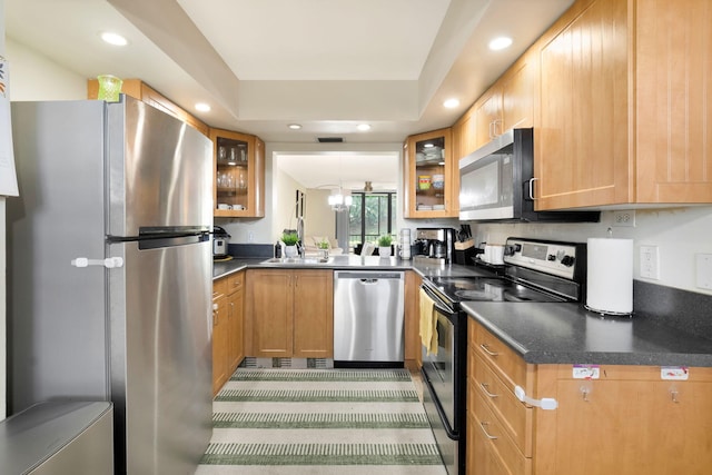 2070 Homewood Blvd Unit 1115, Delray Beach, FL 33445 - kitchen featuring stainless steel appliances, dark countertops, glass insert cabinets, and recessed lighting