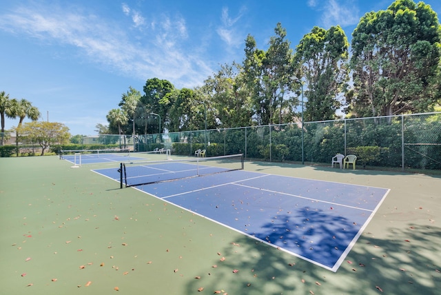2070 Homewood Blvd Unit 1115, Delray Beach, FL 33445 - view of tennis court with fence