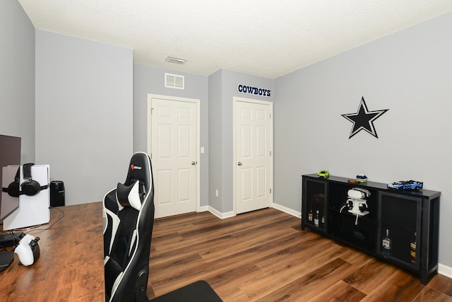 567 SW Paar Dr, Port Saint Lucie, FL 34953 - office featuring wood finished floors and baseboards