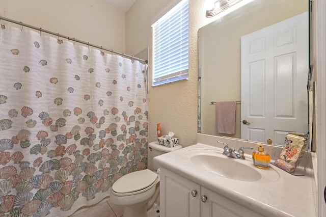 full bath with toilet, vanity, a shower with shower curtain, and a textured wall