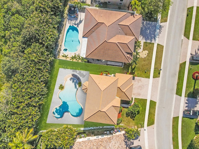 drone / aerial view of a pool