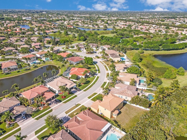 aerial perspective of suburban area featuring a large body of water