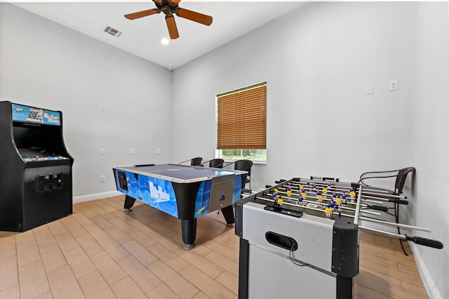 recreation room with a ceiling fan, baseboards, light wood-style floors, and recessed lighting