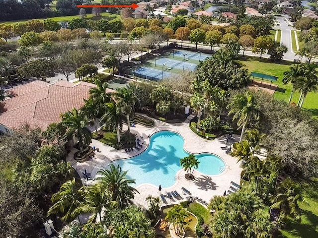 view of property location featuring a pool