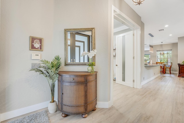 127 Via Castilla, Jupiter, FL 33458 - hall featuring light wood-style floors and recessed lighting