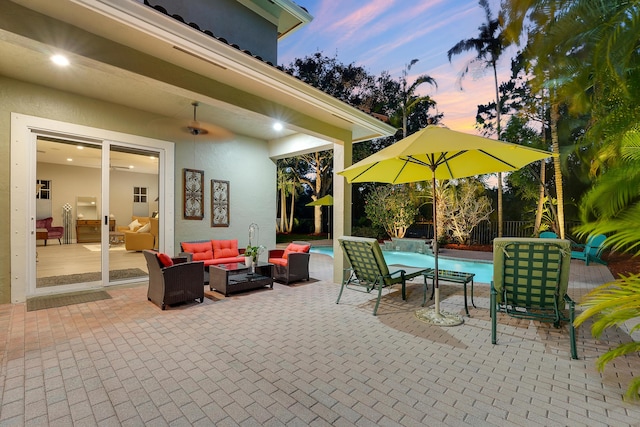 127 Via Castilla, Jupiter, FL 33458 - view of patio with outdoor lounge area and an outdoor pool