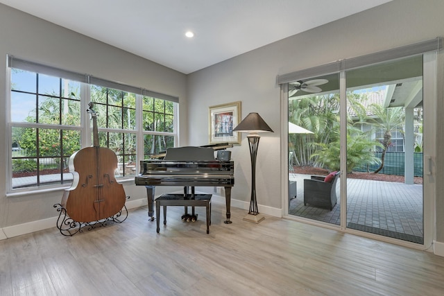 127 Via Castilla, Jupiter, FL 33458 - living area with baseboards, plenty of natural light, wood finished floors, and recessed lighting